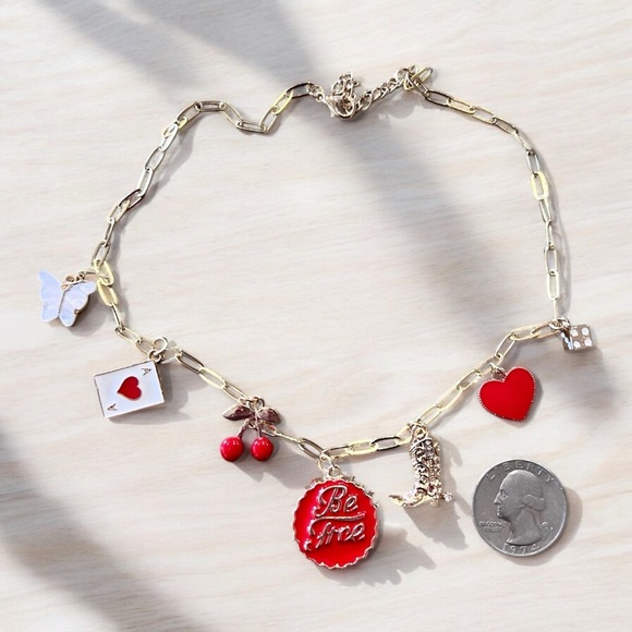 Gold toned dainty and fun Charm Necklace cherries, heart, boot and butterfly - Picture 16 of 16